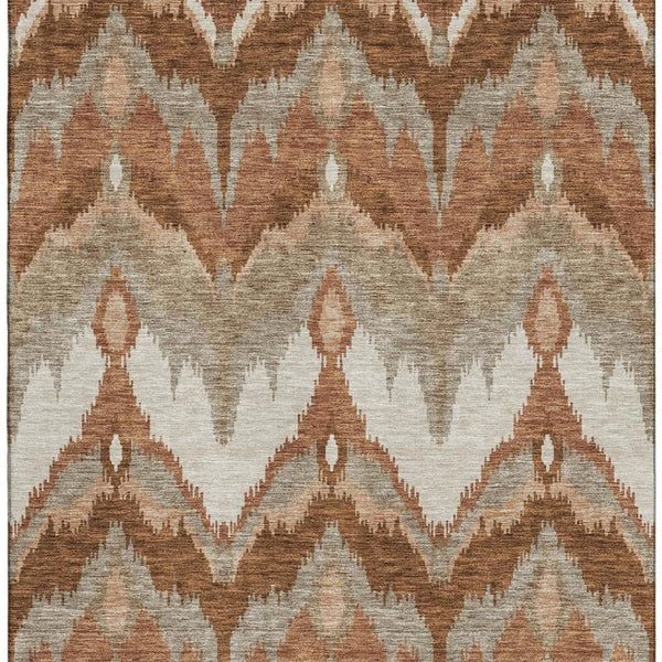 HomeRoots 10' X 14' Stylish Rust and Beige Ikat Area Rug - Durable, Washable, UV-Protected for High-Traffic Spaces 662663