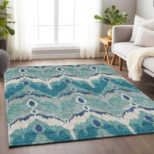 HomeRoots 5' X 8' Teal Ikat Area Rug - Washable, UV-Resistant, Stain-Repellent, Ideal for High-Traffic Spaces 662677