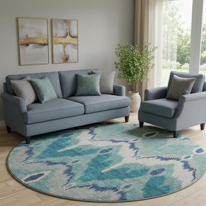 HomeRoots 8' Teal And Ivory Ikat Round Rug - Washable, UV Protected, Stylish Design for High-Traffic Spaces 662678