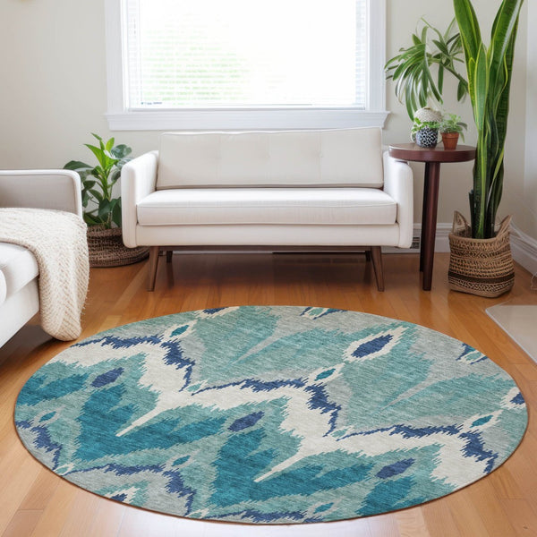 HomeRoots 8' Teal And Ivory Ikat Round Rug - Washable, UV Protected, Stylish Design for High-Traffic Spaces 662678