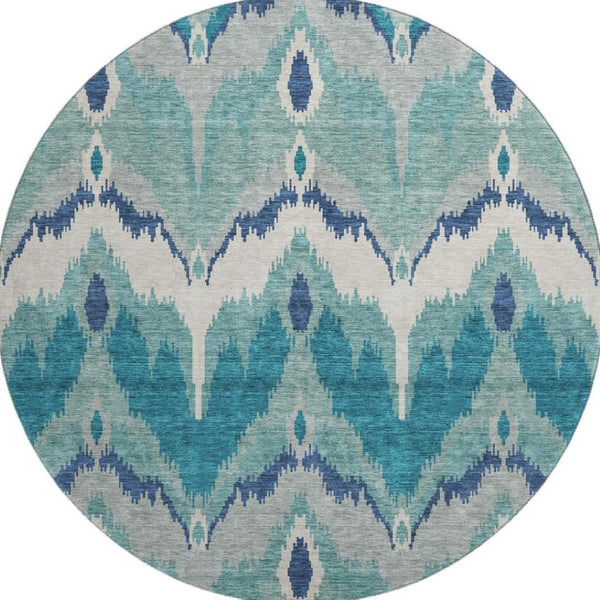 HomeRoots 8' Teal And Ivory Ikat Round Rug - Washable, UV Protected, Stylish Design for High-Traffic Spaces 662678