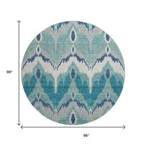HomeRoots 8' Teal And Ivory Ikat Round Rug - Washable, UV Protected, Stylish Design for High-Traffic Spaces 662678