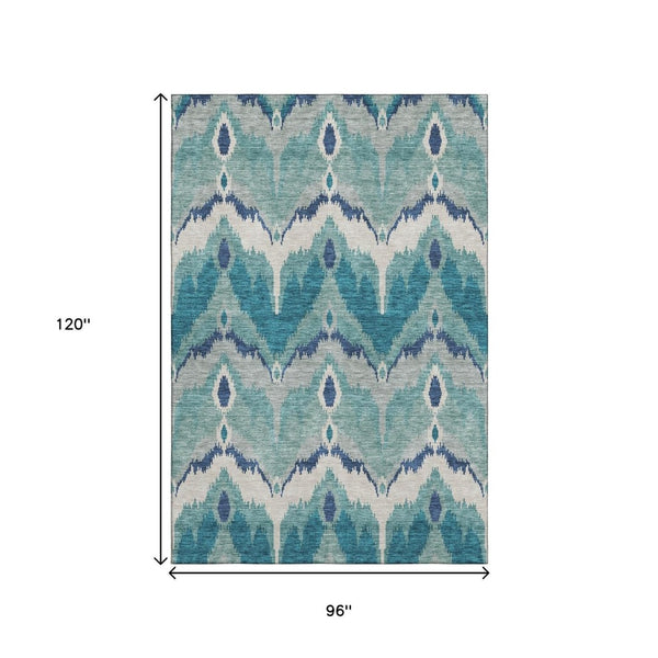 HomeRoots 8' X 10' Teal and Ivory Ikat Washable Area Rug with UV Protection for Stylish, High-Traffic Spaces 662679