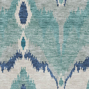 HomeRoots 8' X 10' Teal and Ivory Ikat Washable Area Rug with UV Protection for Stylish, High-Traffic Spaces 662679