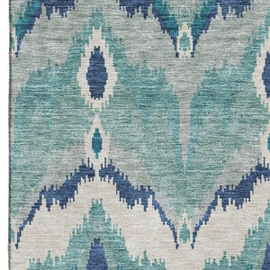 HomeRoots 8' X 10' Teal and Ivory Ikat Washable Area Rug with UV Protection for Stylish, High-Traffic Spaces 662679