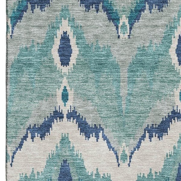 HomeRoots 9' X 12' Teal and Ivory Ikat Area Rug – Durable, Stain-Resistant, UV Protected for Modern Homes 662680