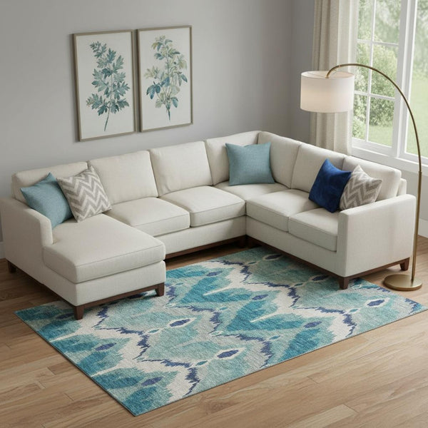 HomeRoots 10' X 14' Teal and Ivory Ikat Area Rug - UV Protected, Washable, Stylish & Durable for Homes 662681