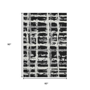 HomeRoots 5' X 8' Stylish Black and Silver Striped Washable Area Rug with UV Protection for Modern Homes 662761