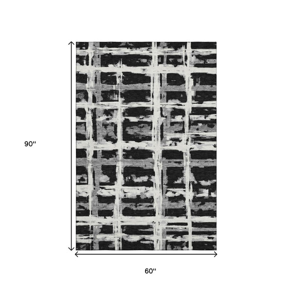 HomeRoots 5' X 8' Stylish Black and Silver Striped Washable Area Rug with UV Protection for Modern Homes 662761