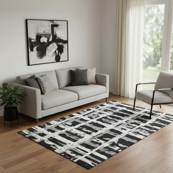 HomeRoots 5' X 8' Stylish Black and Silver Striped Washable Area Rug with UV Protection for Modern Homes 662761