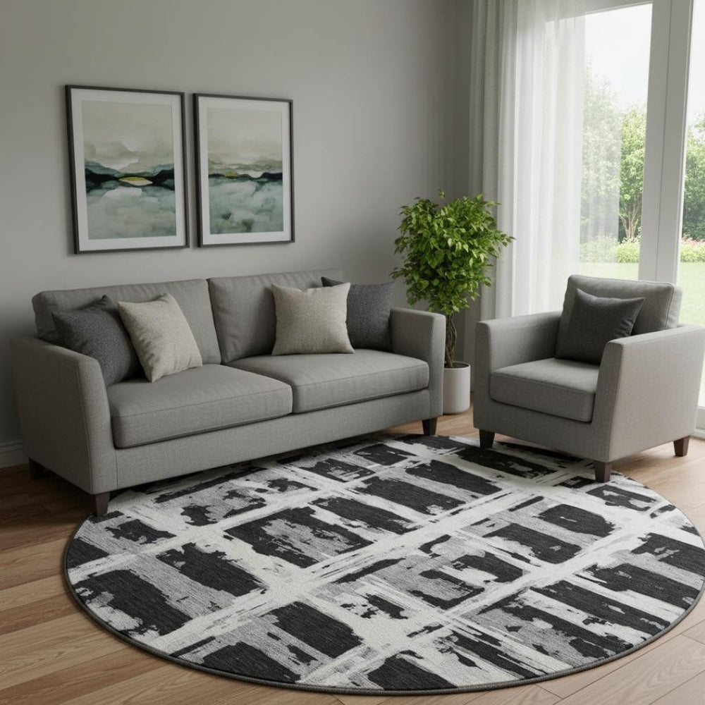 HomeRoots 8' Black and Silver Striped Round Rug - Washable, UV Protected, Durable for High-Traffic Areas 662762
