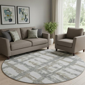 HomeRoots 8' Stylish Silver Ivory Gray Striped Washable Round Rug with UV Protection for Everyday Living 662804