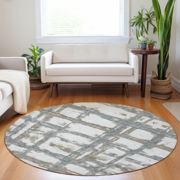 HomeRoots 8' Stylish Silver Ivory Gray Striped Washable Round Rug with UV Protection for Everyday Living 662804