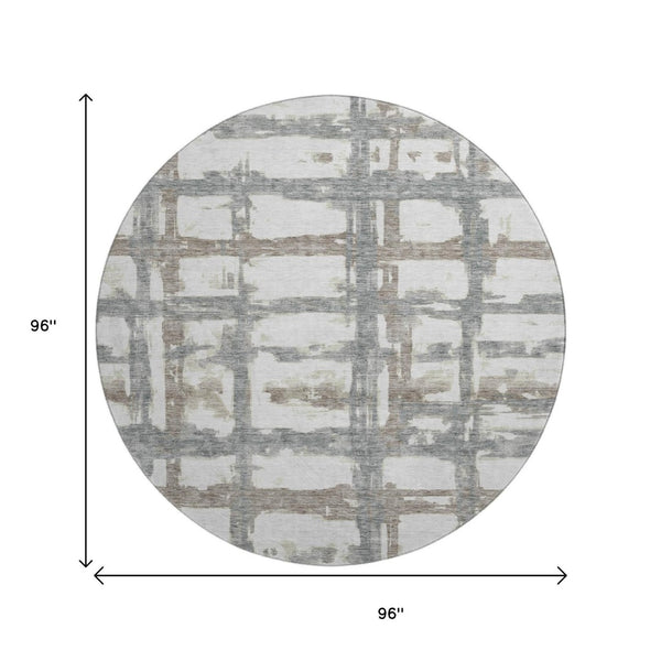 HomeRoots 8' Stylish Silver Ivory Gray Striped Washable Round Rug with UV Protection for Everyday Living 662804