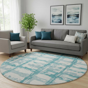 HomeRoots 8' Teal And Ivory Striped Round Rug - Washable, UV-Protected, Perfect for Indoor & Outdoor Spaces 662822