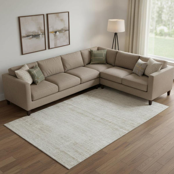 HomeRoots 9' X 12' Ivory And Beige Abstract Area Rug – Stylish, Washable, UV Protected, Ideal for High-Traffic Spaces 662932