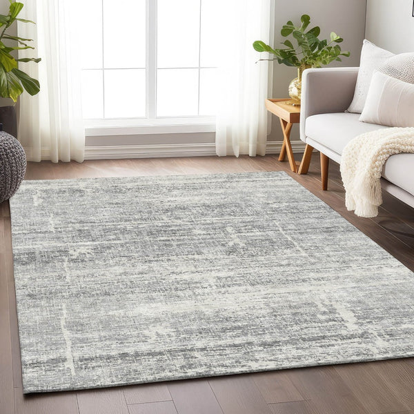 HomeRoots 10' X 14' Silver And Gray Abstract Area Rug – Washable, UV Protected, Perfect for Active Homes! 662951