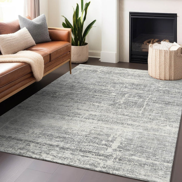 HomeRoots 10' X 14' Silver And Gray Abstract Area Rug – Washable, UV Protected, Perfect for Active Homes! 662951