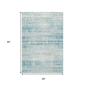 HomeRoots 5' X 8' Teal And Ivory Abstract Area Rug - Washable, UV-Resistant, Durable & Stylish for Homes 662959