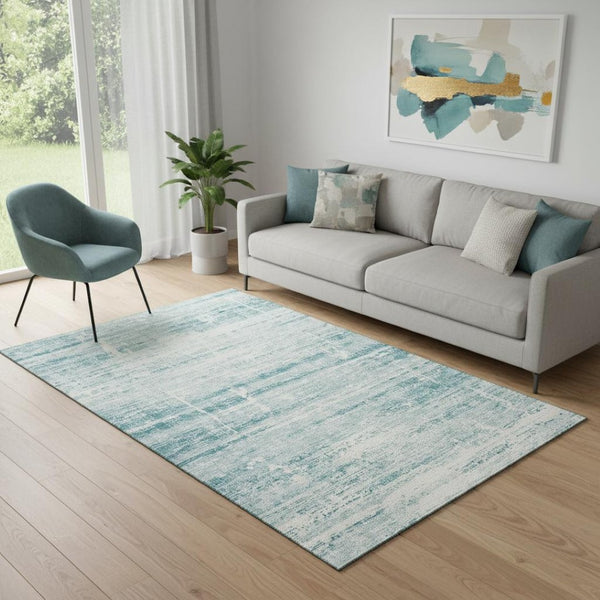 HomeRoots 5' X 8' Teal And Ivory Abstract Area Rug - Washable, UV-Resistant, Durable & Stylish for Homes 662959