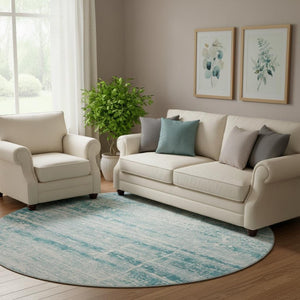 HomeRoots 8' Teal And Ivory Abstract Round Rug - Durable, Stain-Resistant, UV Protected for Modern Spaces 662960