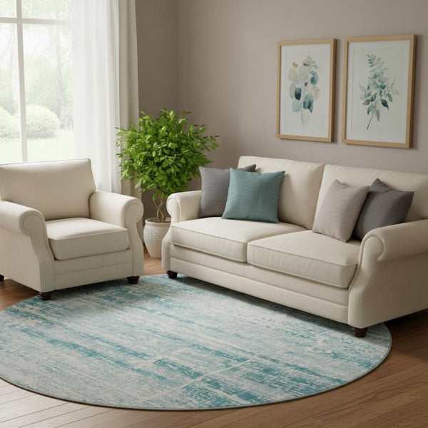 HomeRoots 8' Teal And Ivory Abstract Round Rug - Durable, Stain-Resistant, UV Protected for Modern Spaces 662960