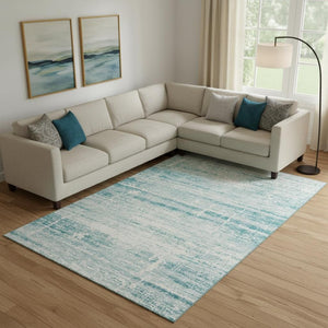 HomeRoots 9' X 12' Teal and Ivory Abstract Washable Area Rug - Stylish, Durable, UV-Protected for Busy Homes! 662962