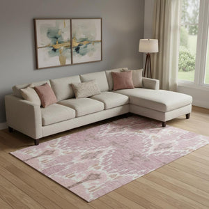 HomeRoots 9' Blush and Ivory Ikat Area Rug - Washable, UV Protected, Durable Design for Family Spaces & Patios 662968