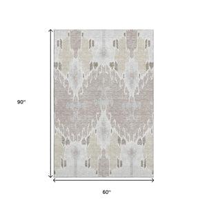 HomeRoots 5' X 8' Stylish Ivory Beige and Gray Ikat Washable Area Rug with UV Protection for Busy Homes 662989