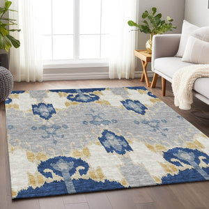 HomeRoots 9' X 12' Ikat Area Rug in Navy Blue, Gold & Ivory - Washable, UV Protected & Stain Resistant! 663004