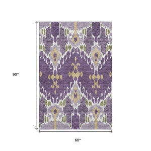 HomeRoots 5' X 8' Ikat Area Rug in Purple, Gold & Ivory – Washable, UV Protected, Kid & Pet Friendly Design! 663019