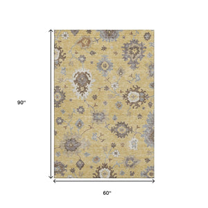 HomeRoots 5' X 8' Floral Medallion Area Rug in Gold, Gray & Ivory - Washable, UV Protected, Stain Resistant! 663283