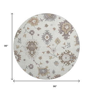 HomeRoots 8' Ivory Gray And Brown Floral Medallion Washable Round Rug with UV Protection for High-Traffic Spaces 663290