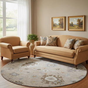 HomeRoots 8' Elegant Taupe Gray & Ivory Floral Medallion Washable Round Rug with UV Protection & Stain Resistance 663320