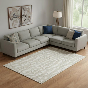 HomeRoots 9' X 12' Washable Beige and Ivory Cobblestone Area Rug with UV Protection for High-Traffic Areas 663340