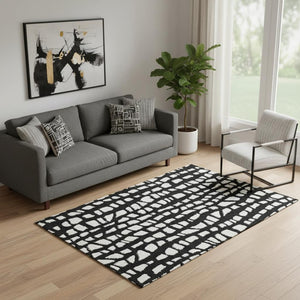 HomeRoots 5' X 8' Black and Ivory Cobblestone Area Rug - Durable, Washable, UV-Protected for Everyday Use! 663343
