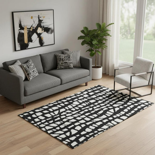HomeRoots 5' X 8' Black and Ivory Cobblestone Area Rug - Durable, Washable, UV-Protected for Everyday Use! 663343