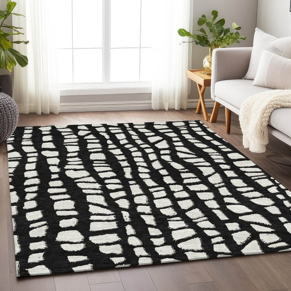 HomeRoots 5' X 8' Black and Ivory Cobblestone Area Rug - Durable, Washable, UV-Protected for Everyday Use! 663343