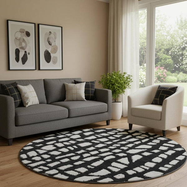HomeRoots 8' Black and Ivory Cobblestone Washable Round Rug - UV Protected, Durable & Easy-Clean Design! 663344