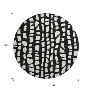 HomeRoots 8' Black and Ivory Cobblestone Washable Round Rug - UV Protected, Durable & Easy-Clean Design! 663344