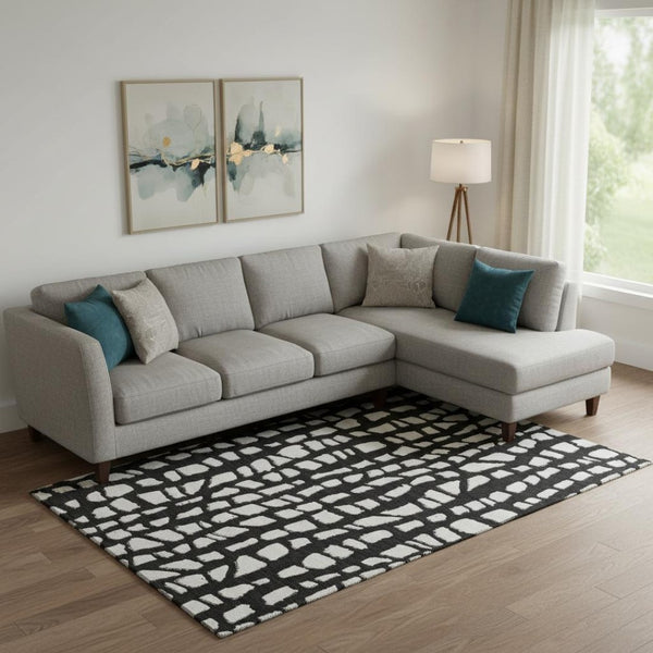 HomeRoots 10' X 14' Black & Ivory Cobblestone Area Rug - Washable, UV Protected, Stain Resistant for High Traffic Homes 663347