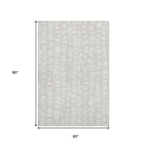 HomeRoots 5' X 8' Ivory & Beige Cobblestone Area Rug - Soft, Stain-Resistant, UV Protected for High-Traffic Spaces 663361