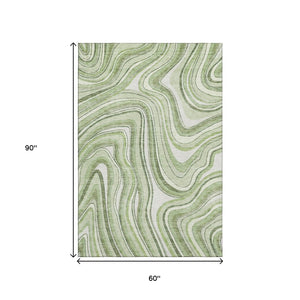 HomeRoots 5' X 8' Artichoke Green & Ivory Marble Area Rug - Washable, UV-Protected & Stain-Resistant Design 663496