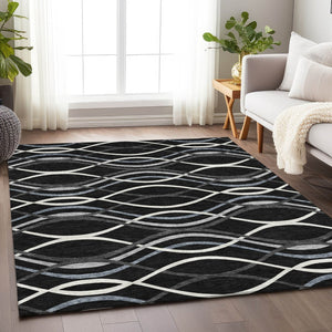 HomeRoots 5' X 8' Modern Black, Ivory & Gray Abstract Area Rug – Washable, Stain Resistant, UV Protected Design 663568