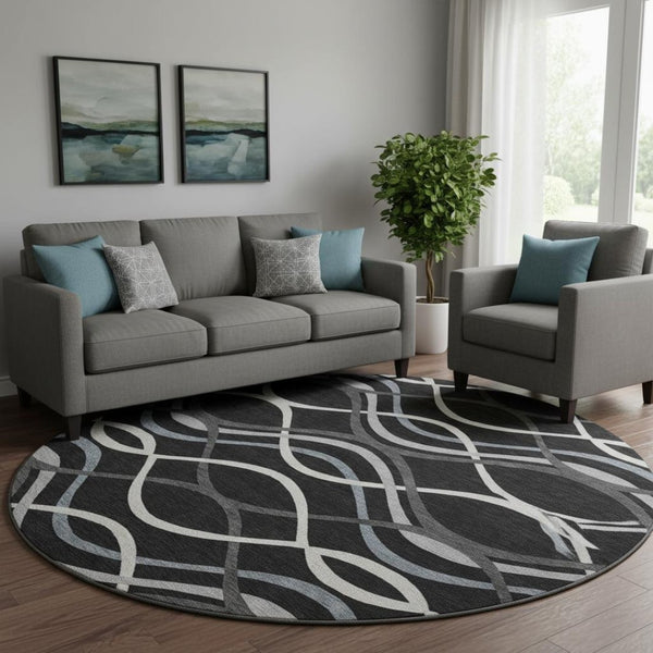HomeRoots 8' Black Ivory and Gray Abstract Washable Round Rug - UV Protected, Stain Resistant, Modern Design 663569