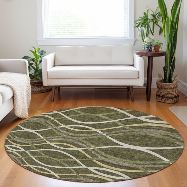 HomeRoots 8' Olive Green Abstract Round Rug - Stylish, Washable, UV-Protected, and Durable for Modern Homes 663601