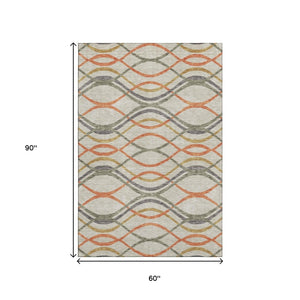 HomeRoots 5' X 8' Vibrant Orange Ivory Gold Abstract Area Rug - Washable, UV Protection, Stain Resistant Style! 663606