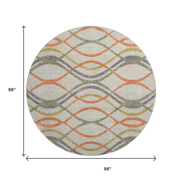 HomeRoots 8' Stylish Orange, Ivory & Gold Abstract Washable Round Rug with Stain Resistance & UV Protection 663607