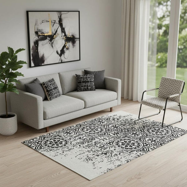 HomeRoots 5' X 8' Black and Ivory Medallion Area Rug - Washable, Stain-Resistant with UV Protection & Style 663661