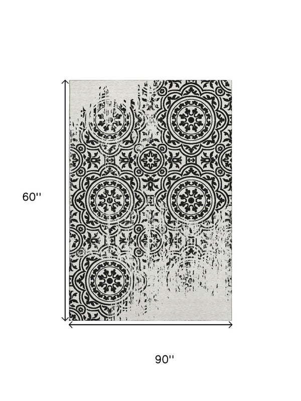 HomeRoots 5' X 8' Black and Ivory Medallion Area Rug - Washable, Stain-Resistant with UV Protection & Style 663661